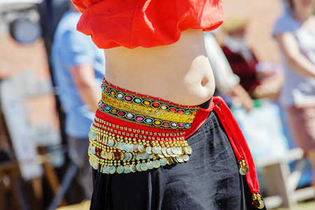 Close up shot of a belly dancer wearing typical arabic costumeの写真素材