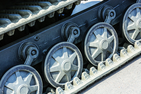 Closeup of military skating tank caterpillar wheelの写真素材