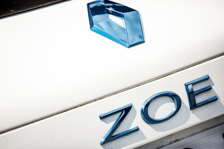 Puilboreau, France - June 1, 2017: A closeup view of the name and logo on the trunk of the 100% electric car "Zoe" by Renault.のeditorial素材