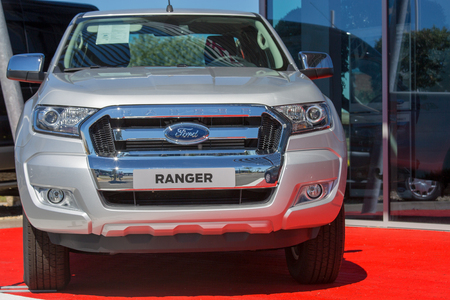 Puilboreau, France - August 7, 2016 : The Ford Ranger on display outside showroom on red carpet on bright sunny day at Puilboreau, France. The Ford Ranger is a nameplate that has been used on three distinct model lines of vehicles sold by Ford.のeditorial素材