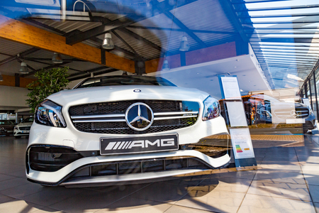 Puilboreau, France - August 7, 2016 : Front view of Mercedez-Benz MG car inside showroom on a sunny day at Puilboreau, France. AMG is the high performance car brand used by Mercedes-Benz.のeditorial素材