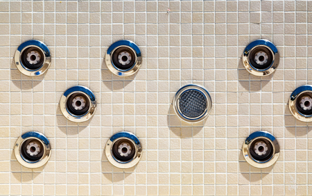 Closeup of empty original mosaic spa bath tubsの写真素材
