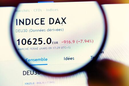 Closeup on Dax German indice in downtrend magnified with a magnifying glassの写真素材