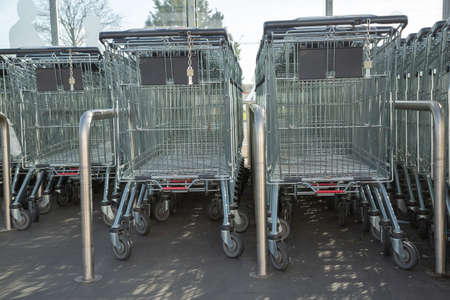 Cognac, France - February 21, 2020:Lidl Supermarket shopping trolleys aligned and stored in an empty supermarket with no customersのeditorial素材