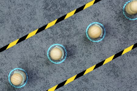 concept of marking on the ground and signage, for physical or social distance in the street or in the workplace to fight against the transmission of the covid-19 virusの写真素材