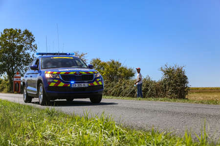Benon, France - September 9, 2020: Gendarmerie patrol on a country road in escort during the tour de france cyclistのeditorial素材