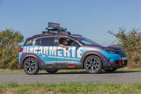 Benon, France - September 9, 2020: Gendarmerie patrol on a country road in escort during the tour de france cyclistのeditorial素材