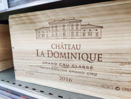 Builboreau, France - October 14, 2020: Close-up of a wooden wine box containing a great French wine classified under the appellation Saint-Emilion Classified Growthsのeditorial素材