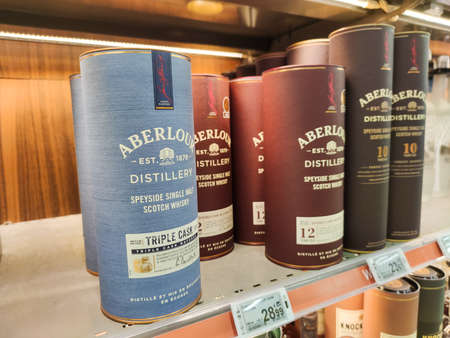 Supermarket shelves filled with many different types of Aberlour brand Whiskey.のeditorial素材