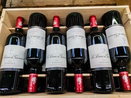 Surgeres, France - October 17, 2020: close-up of a wooden wine box containing a great French wine classified under the appellation Margauxのeditorial素材