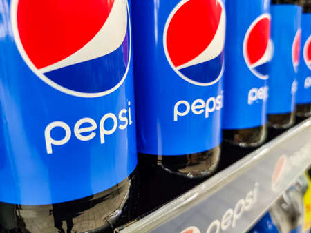 Puilboreau, France - October 14, 2020: Row of PEPSI cola soft drink bottle's display for sell in the...
