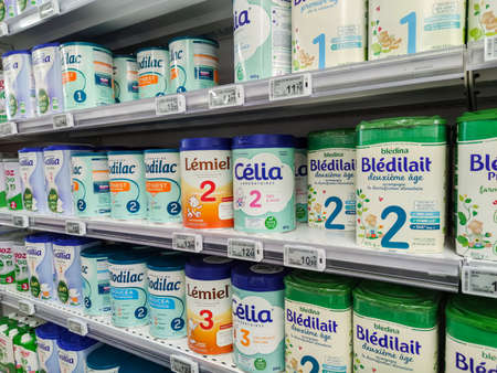 Puilboreau, France - October 14, 2020: Selected various brands collection of powdered Baby Milk display for sell in french supermarketのeditorial素材