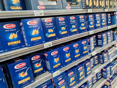 Puilboreau, France - October 14, 2020: Selected collection of pasta Barilla brand display for sell in french supermarketのeditorial素材