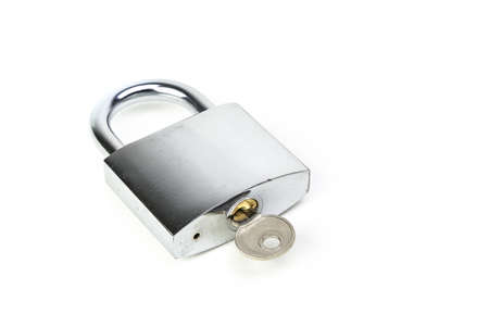 closeup on hardened steel padlock on white backgroundの写真素材