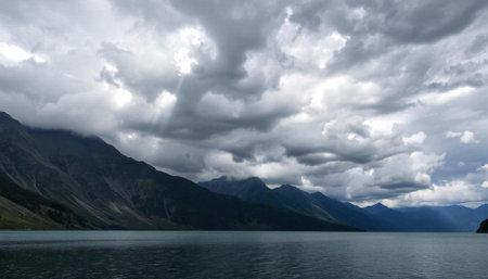 Clouds over the lake in the mountains of the Altai Republic