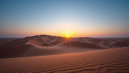 Sunset over the sand dunes in the Sahara desert, Moroccoの写真素材