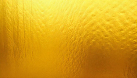 Textured Gold Foil Background with Subtle Highlights and Shadows