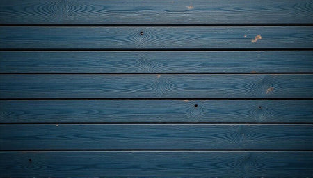 Blue painted wooden planks creating a rustic background textureの写真素材