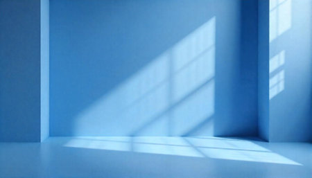 Blue room illuminated by sunlight streaming through window panesの写真素材