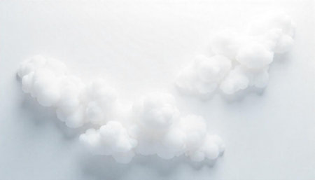 Soft white clouds formation against white background overhead view