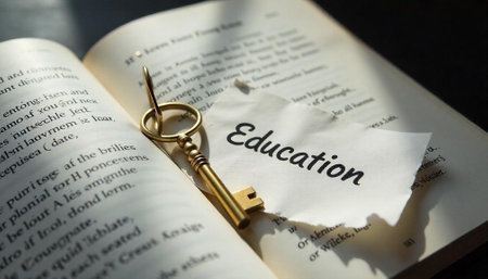 Golden Key Resting on a Book with Education Noteの写真素材