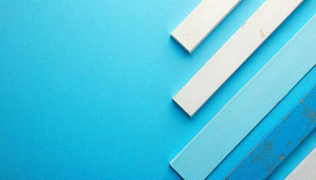 Wooden planks with varying shades of blue on background