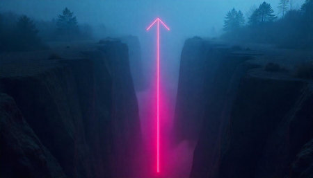 Neon arrow between two cliffs in misty landscapeの写真素材