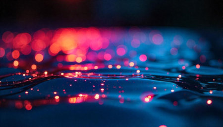 Abstract blue water surface with glowing red bokeh lights