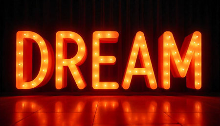 Illuminated Dream Sign in Red and Yellow Lightbulbsの写真素材