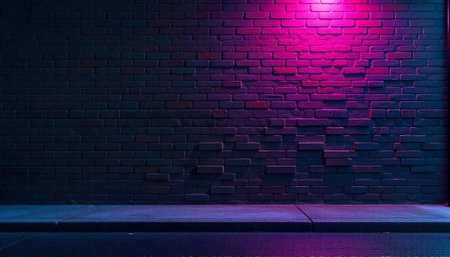 Urban brick wall illuminated with vibrant pink neon lightの写真素材