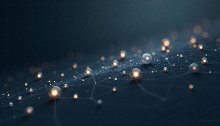 Network of interconnected metallic spheres on dark backgroundの写真素材