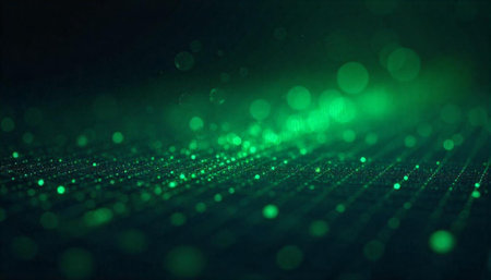 Green abstract background with bokeh and glowing particlesの写真素材