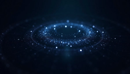 Abstract blue sparkling particles forming circular shapes on dark background