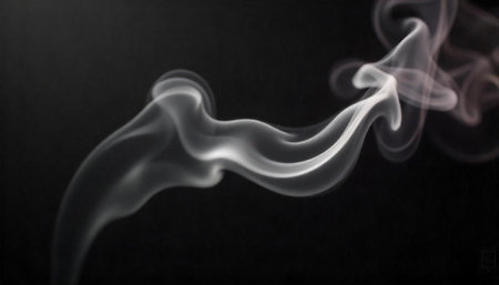 Abstract smoke trails flowing across a dark background backdropの写真素材
