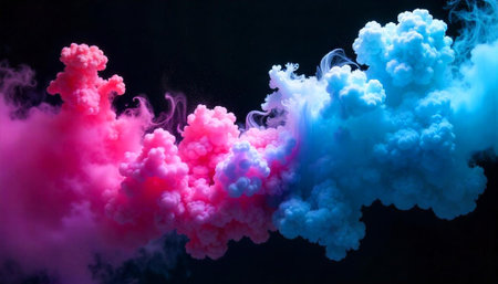 Pink and blue smoke meeting on a black backgroundの写真素材