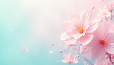 Floral background with soft pink blossoms in pastel hues
