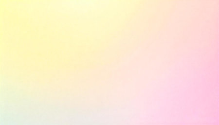 Gentle pastel gradient background with soft yellow and pinkの写真素材