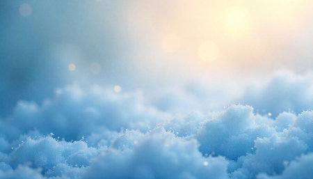 Dreamy sky with fluffy blue clouds and sunlight backgroundの写真素材