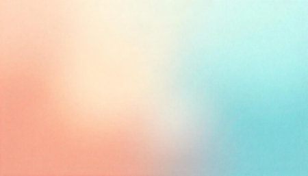 Soft pastel gradient background with peach and light blue huesの写真素材
