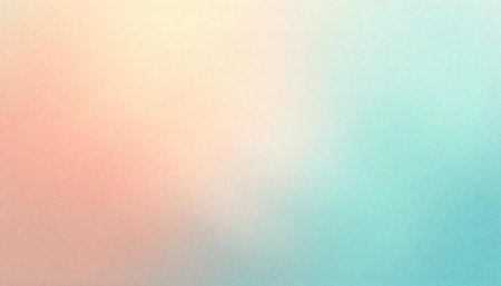 Subtle gradient background texture blending peach and light blueの写真素材