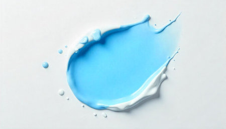 Abstract splash of light blue and white paint