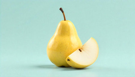 Fresh yellow pear with a slice on light background