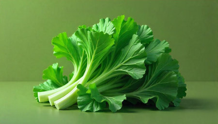 Fresh green collard greens on a matching green surface