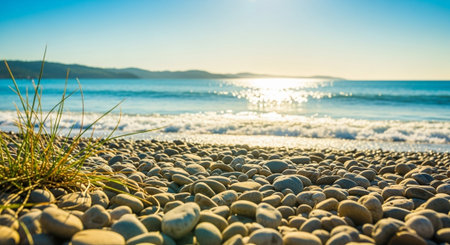 Pebble beach landscape with ocean view on sunny dayの写真素材