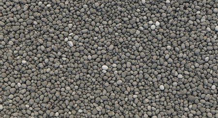 Seamless background of many small grey rocks and pebbles
