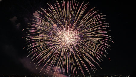 Atmospheric night scenes featuring vibrant bonfires and celebratory fireworks in a natural forest...