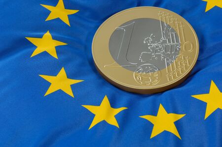 One-Euro-coin on a european flagの写真素材