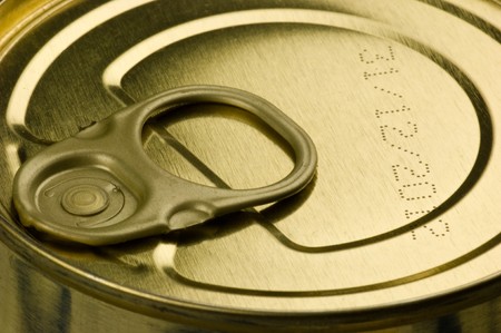 Aperture ring on a gold-colored tin