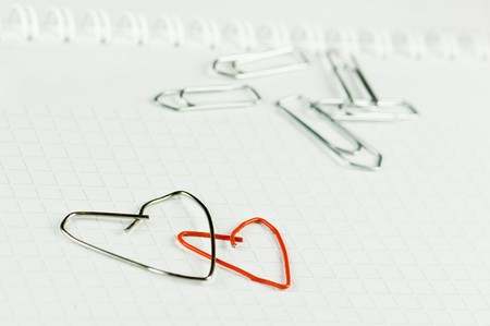 Paper clips formed as heartsの写真素材