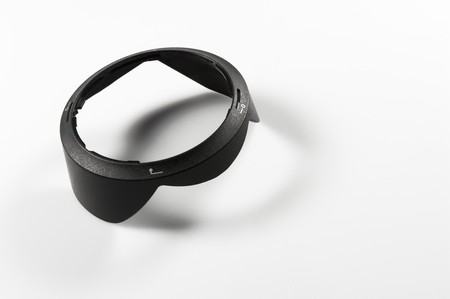 Lenshood of a camera on white groundの写真素材